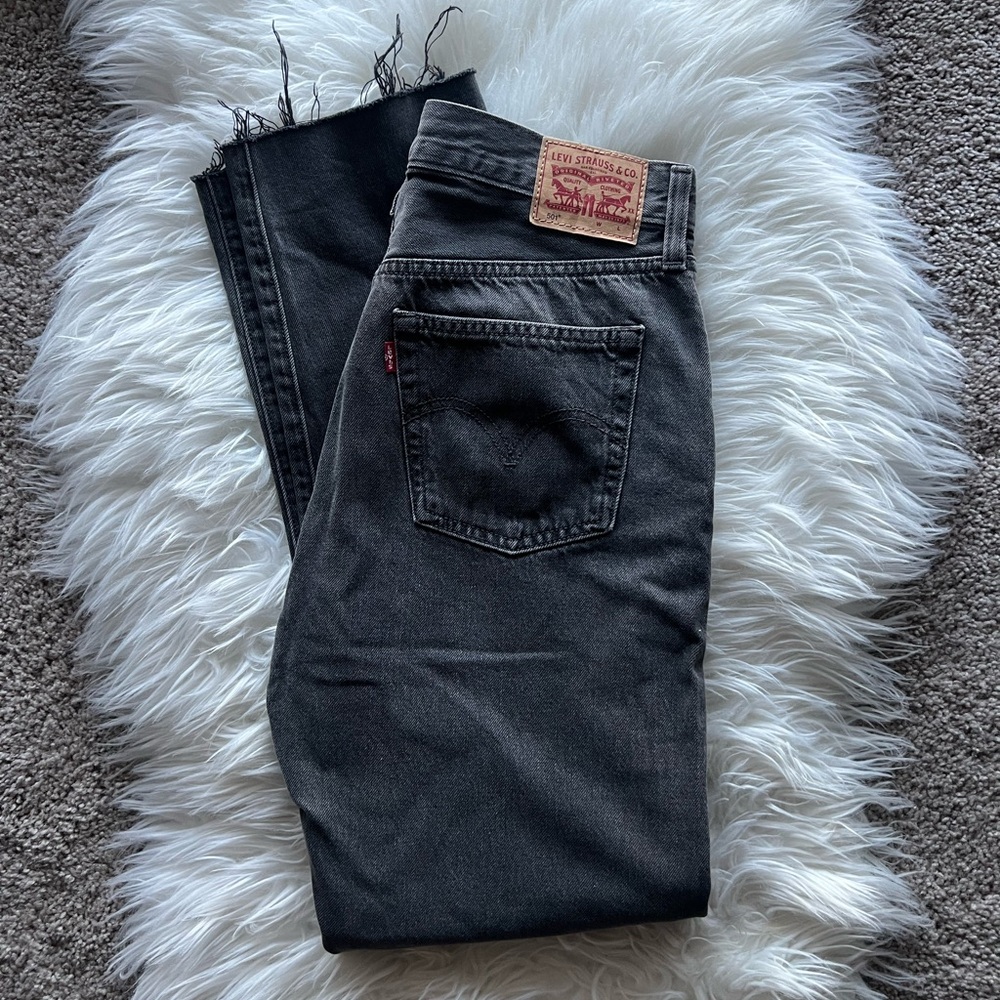 Levi's 501 Black Straight High Rise Jeans with frayed ankles